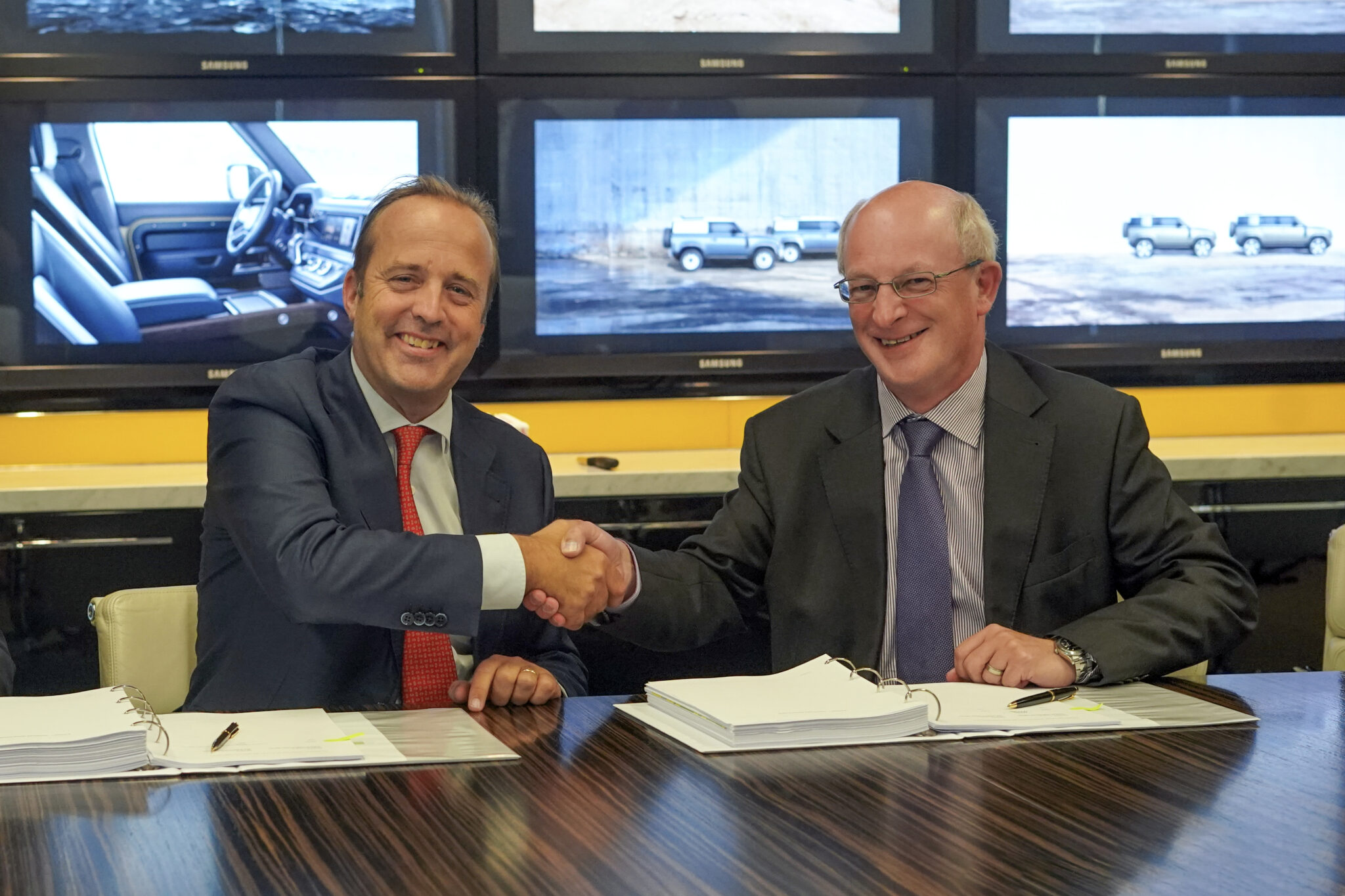 Logistics Contract Signing DHL Supply Chain and Jaguar Land Rover extend contract | Logistics Manager